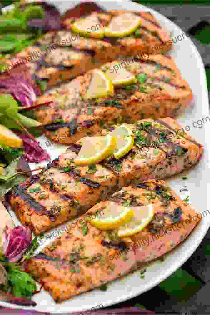 Perfectly Grilled Salmon Fillet, Its Succulent Flesh Flaking Apart, Topped With A Luscious Lemon Herb Butter That Melts And Sizzles On Its Surface Recipes To Try In The Locke Key Game: Delish Ways To Unlock The Door To Your Heart